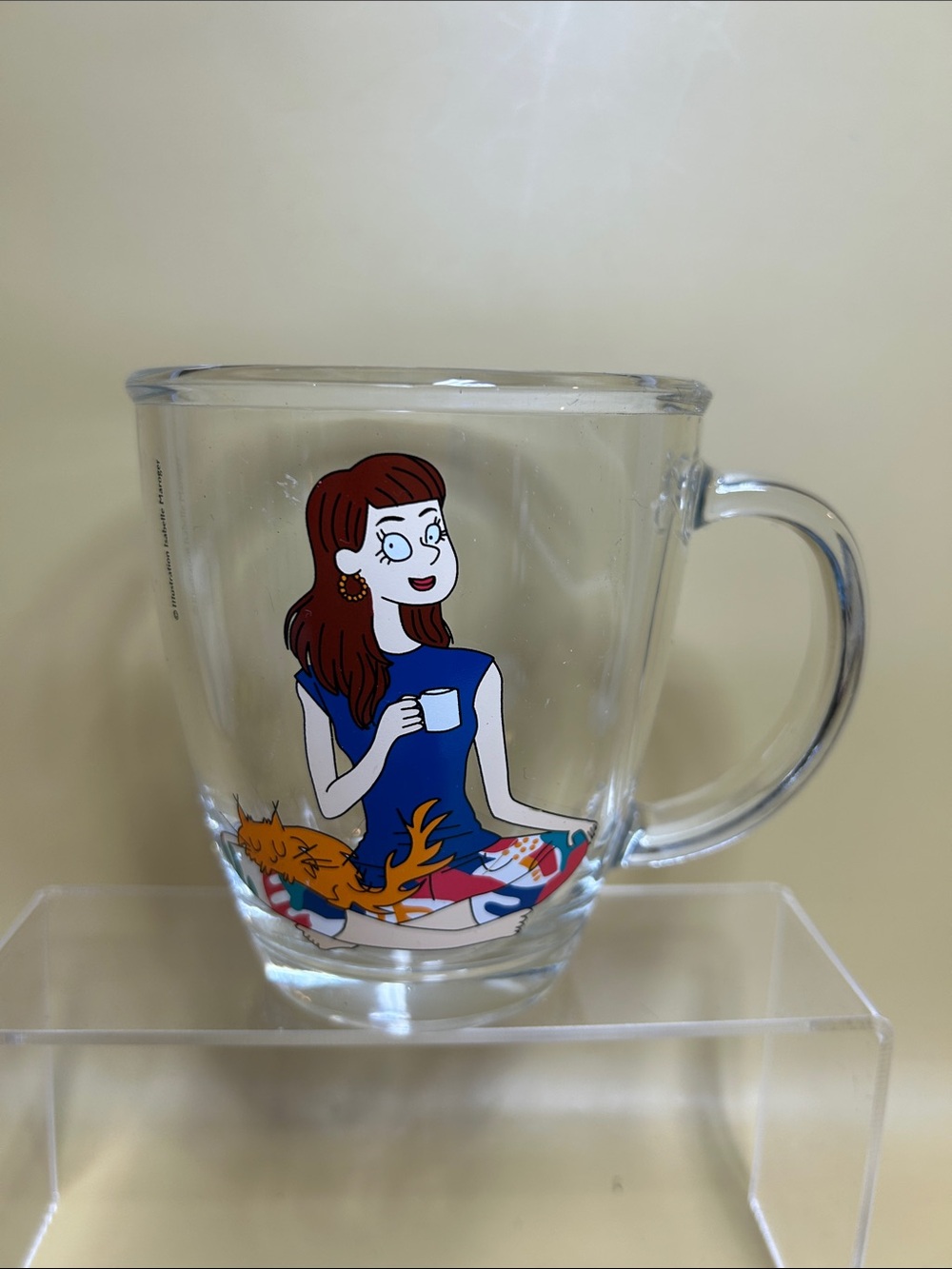 Clear Glass Mug Cartoon Woman and Orange Cat Illustration by Isabelle Maroger